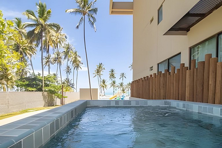 Apartamento a pie de playa en resort con piscina privada por