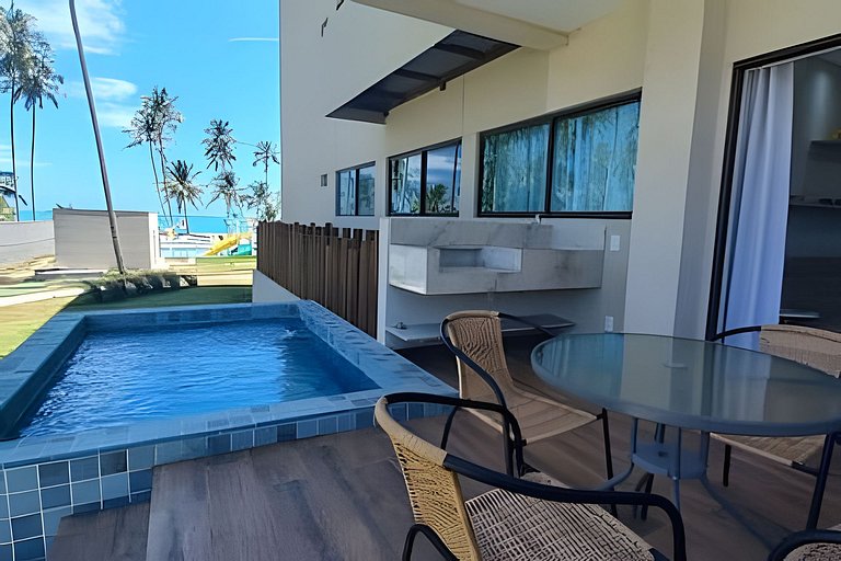 Apartamento a pie de playa en resort con piscina privada por