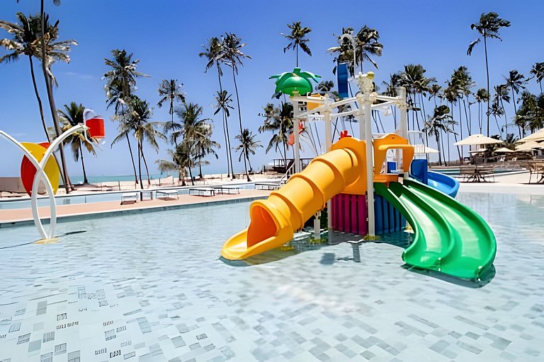 Apartamento a pie de playa en resort con piscina privada por